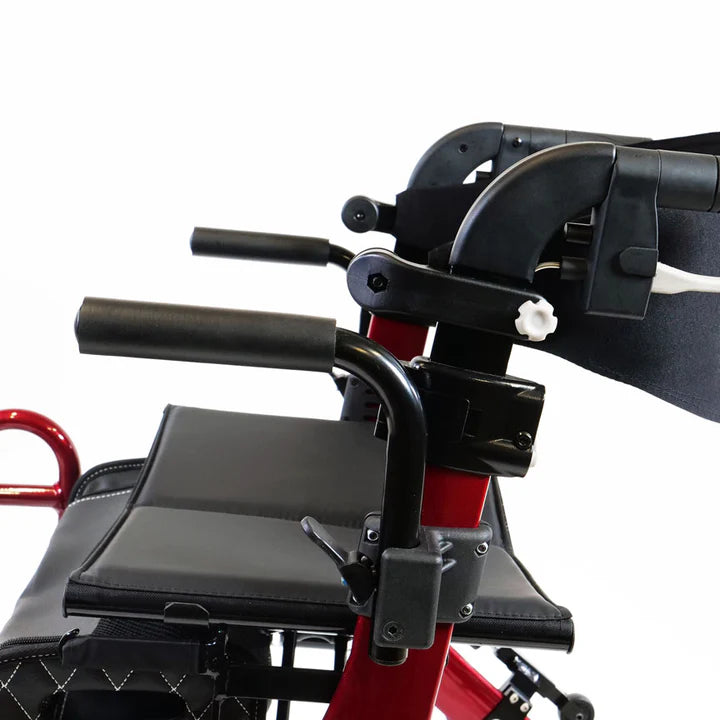 Close-up of a red and black rollator with a focus on the seat and handlebars.