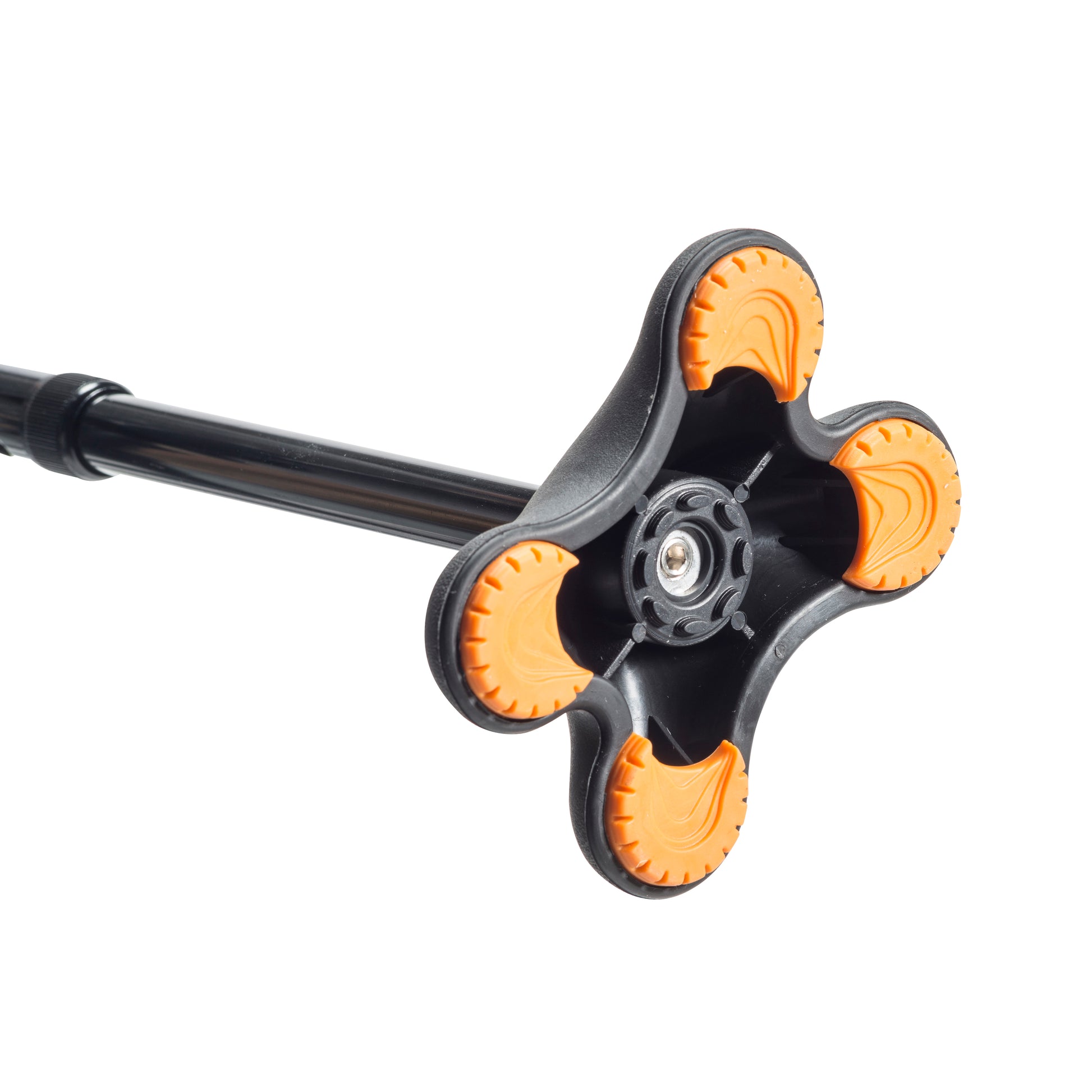 Close-up of a black cane and orange rubber with a white background