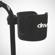 Black cup holder attached to a scooter handlebar with 'drive' branding.