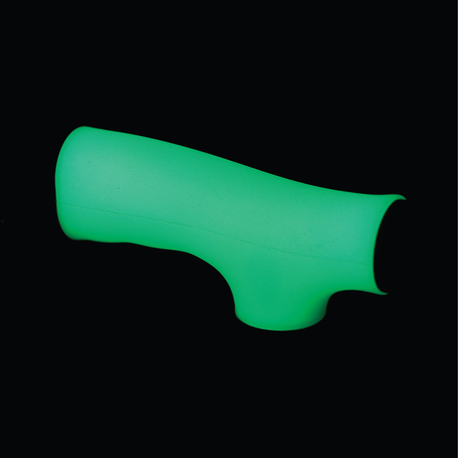 Green silicone sleeve on a black background