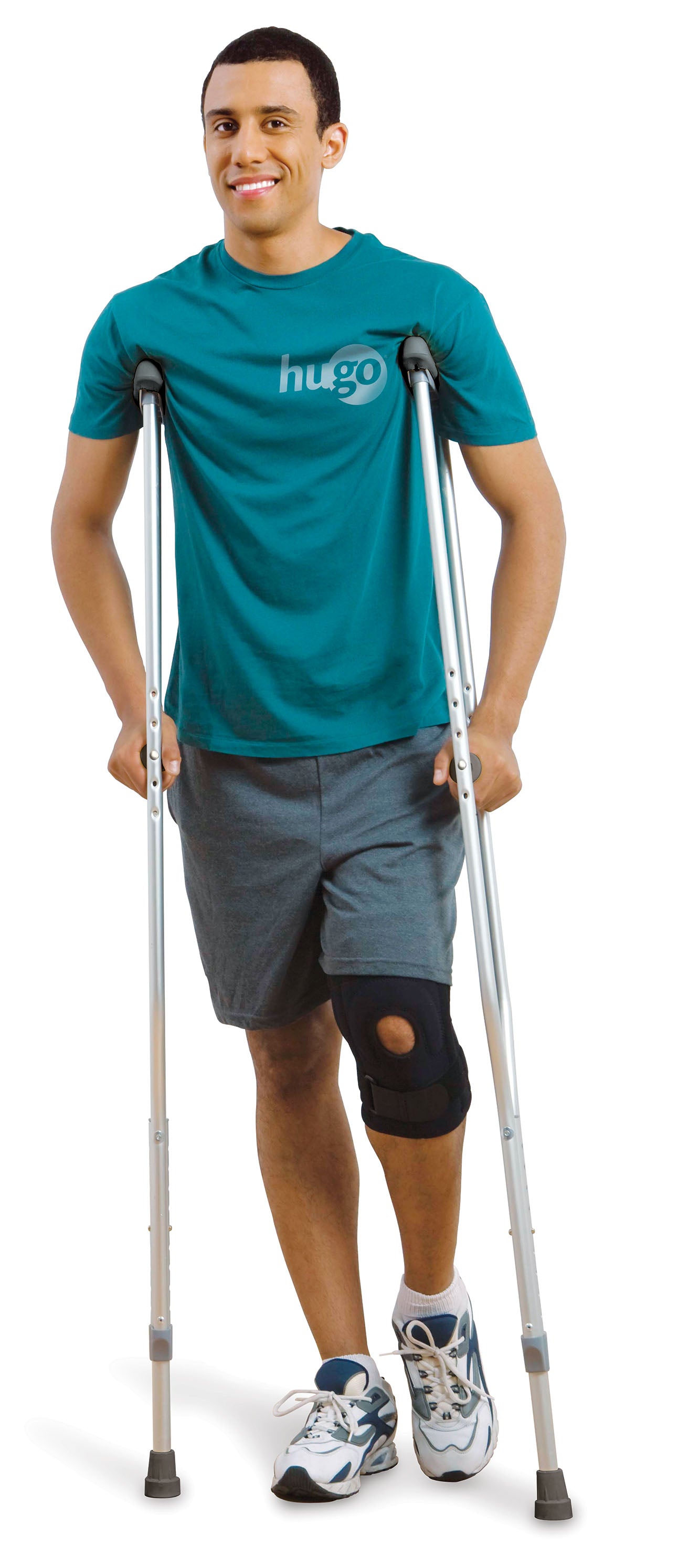 Man using crutches with a knee brace on a white background