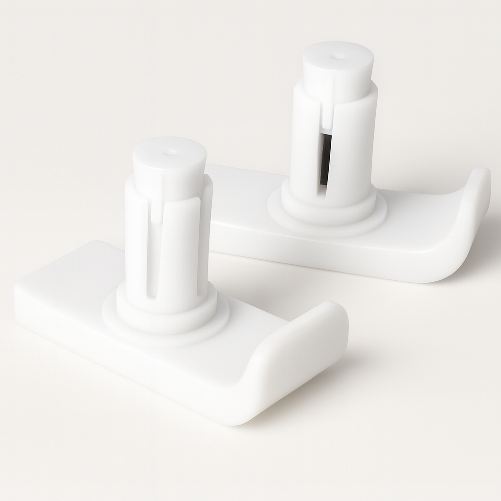 Two white plastic caps for walkers on a light gray background