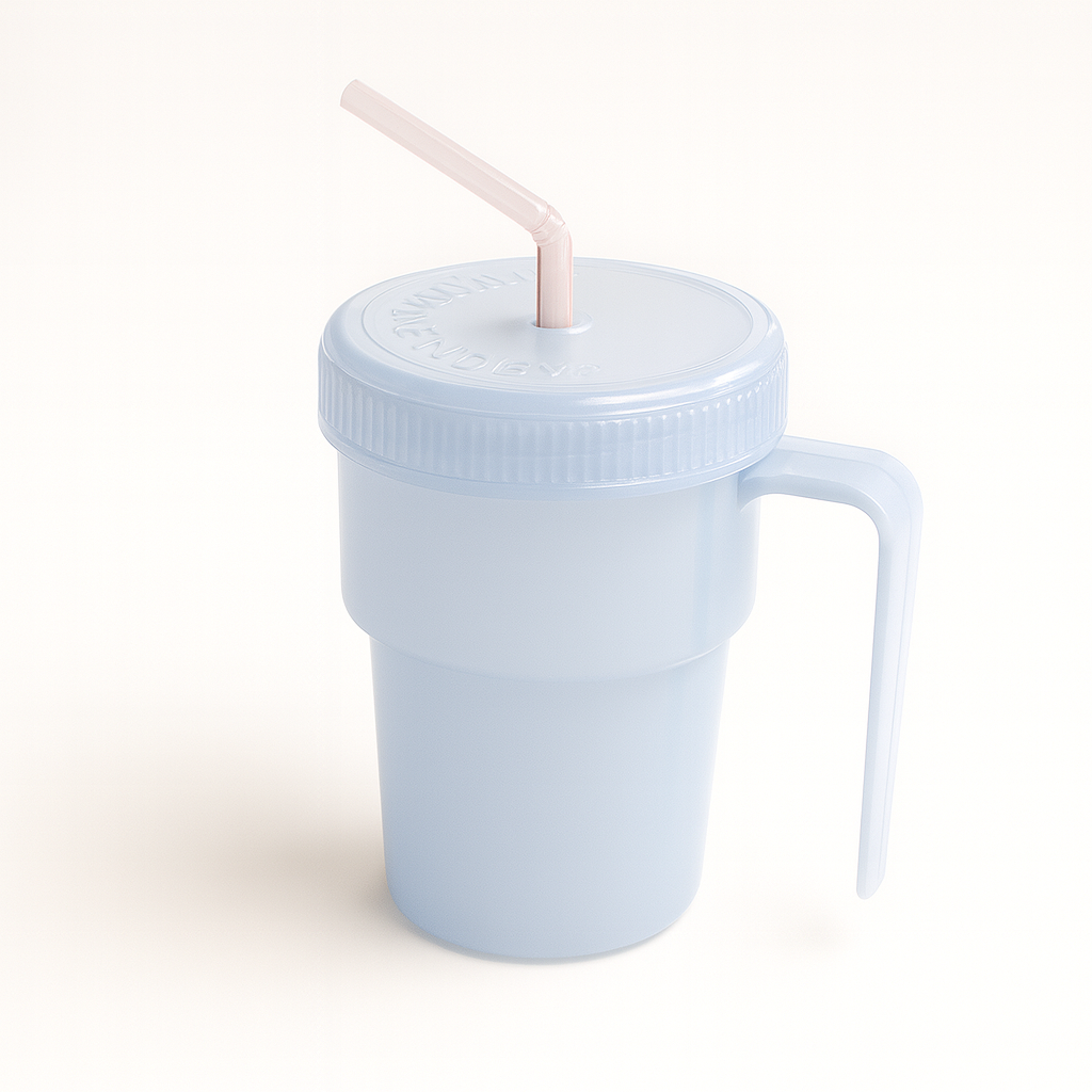 Light blue tumbler with a straw on a white background
