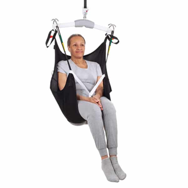 Person using a black medical sling on a white background