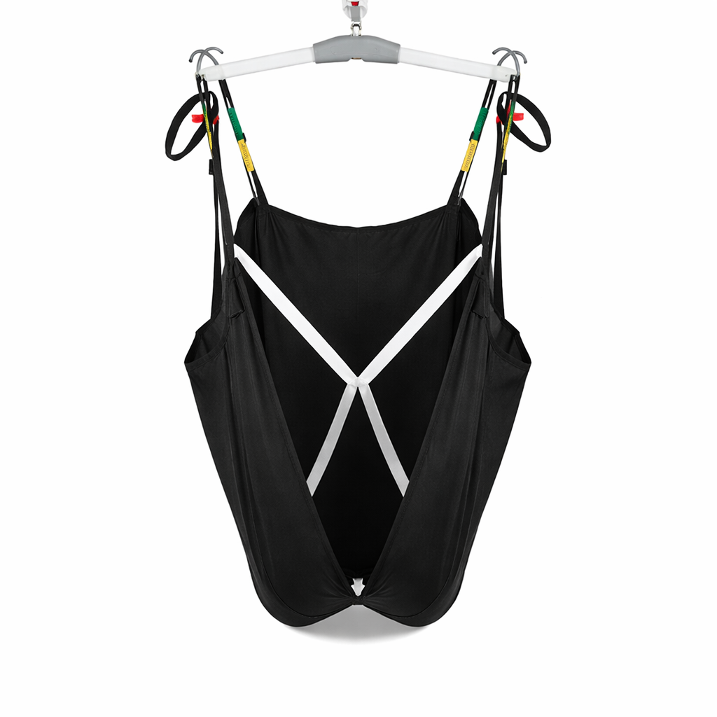 Black and white string on a lift with colorful straps.