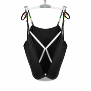 Black and white string on a lift with colorful straps.